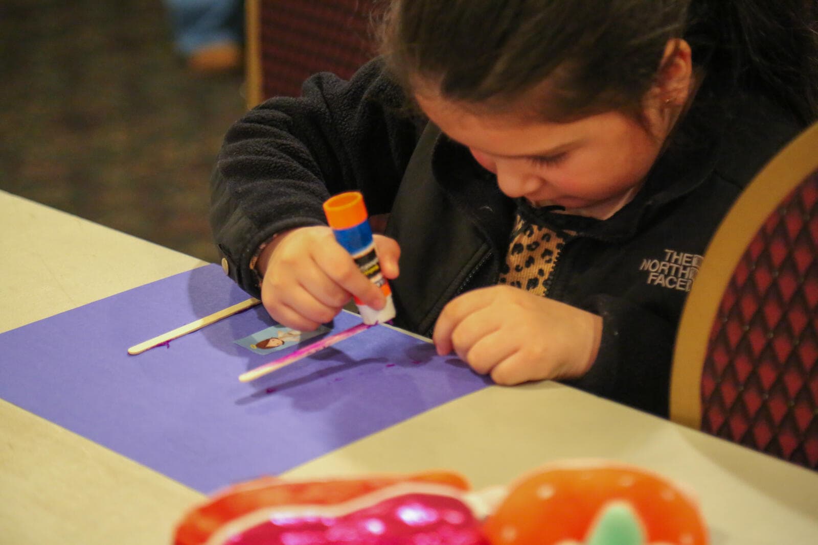 Girl doing crafts at Sunday school