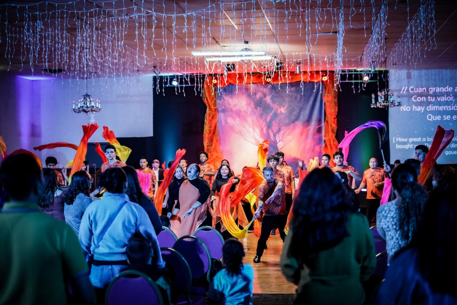 Dance ministry performing with colorful flags